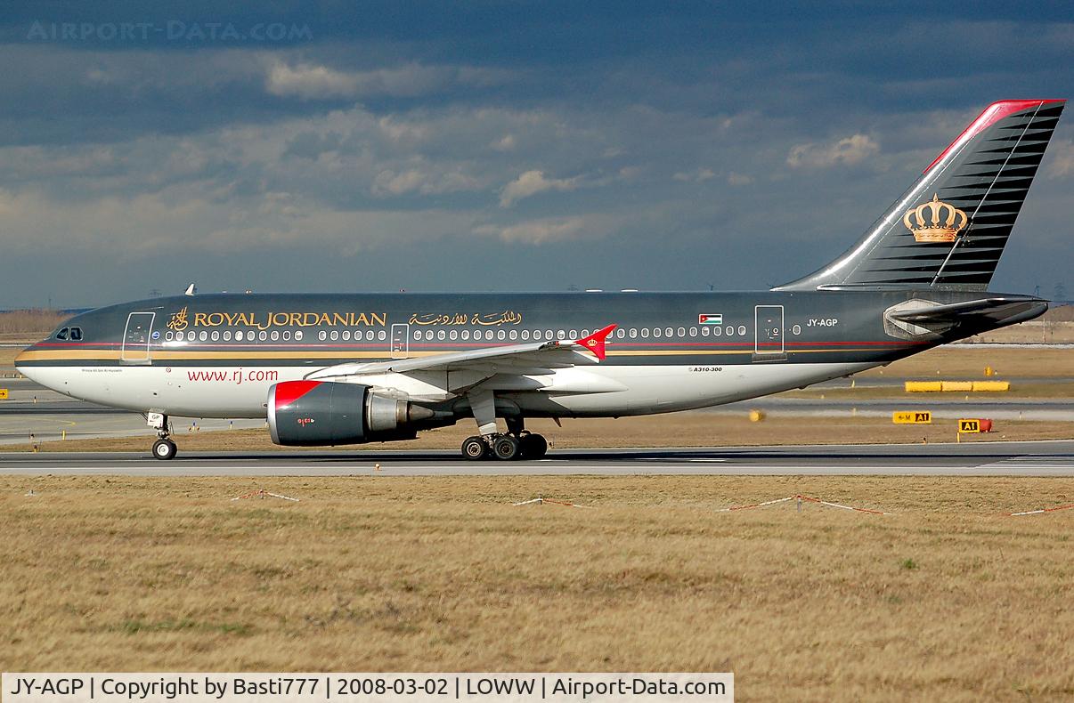 JY-AGP, 1986 Airbus A310-304 C/N 416, Between the clouds