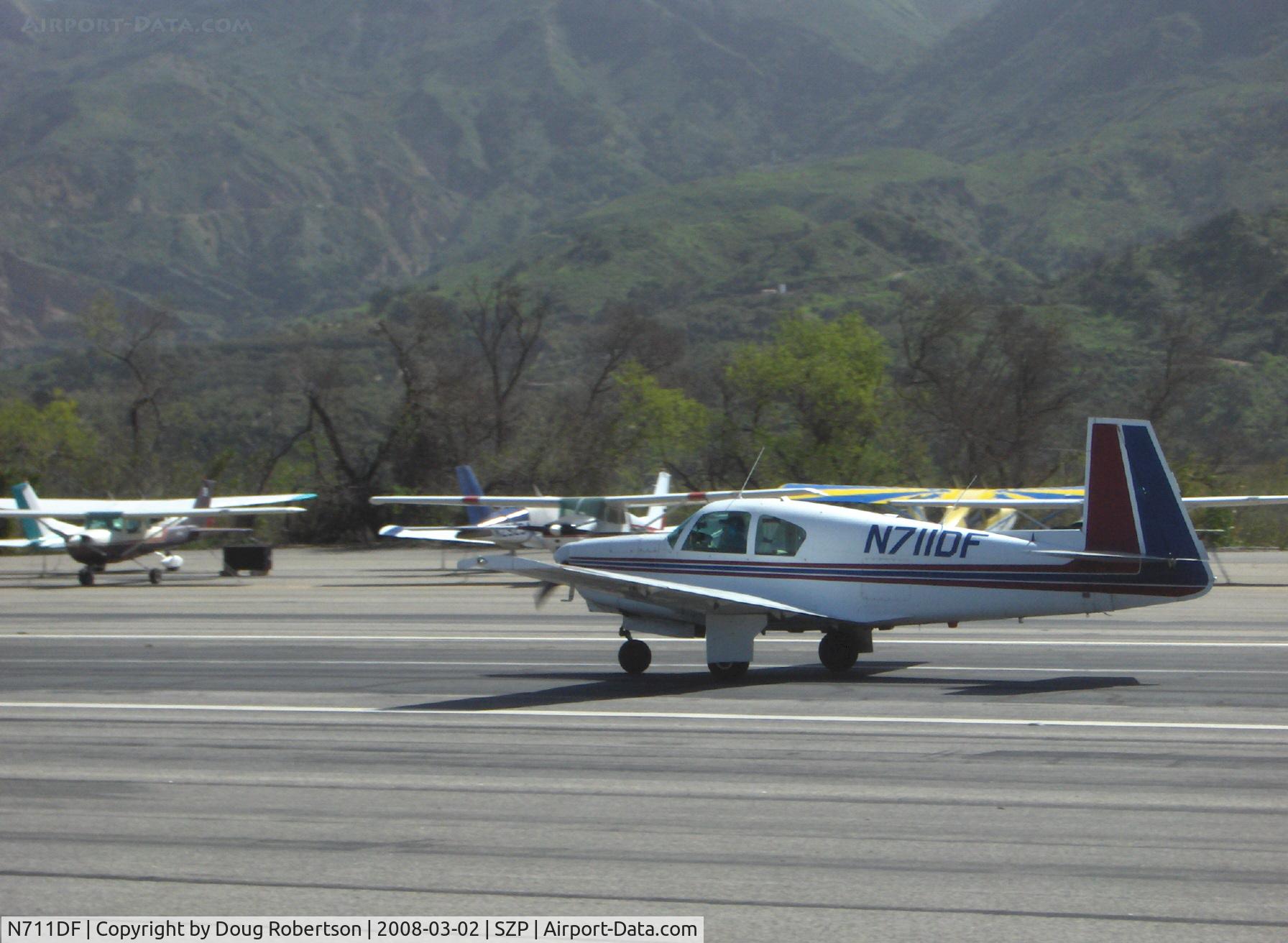 N711DF, 1963 Mooney M20C Ranger C/N 2532, 1963 Mooney M20C, Lycoming O&VO-360 180 Hp, landing roll Rwy 04
