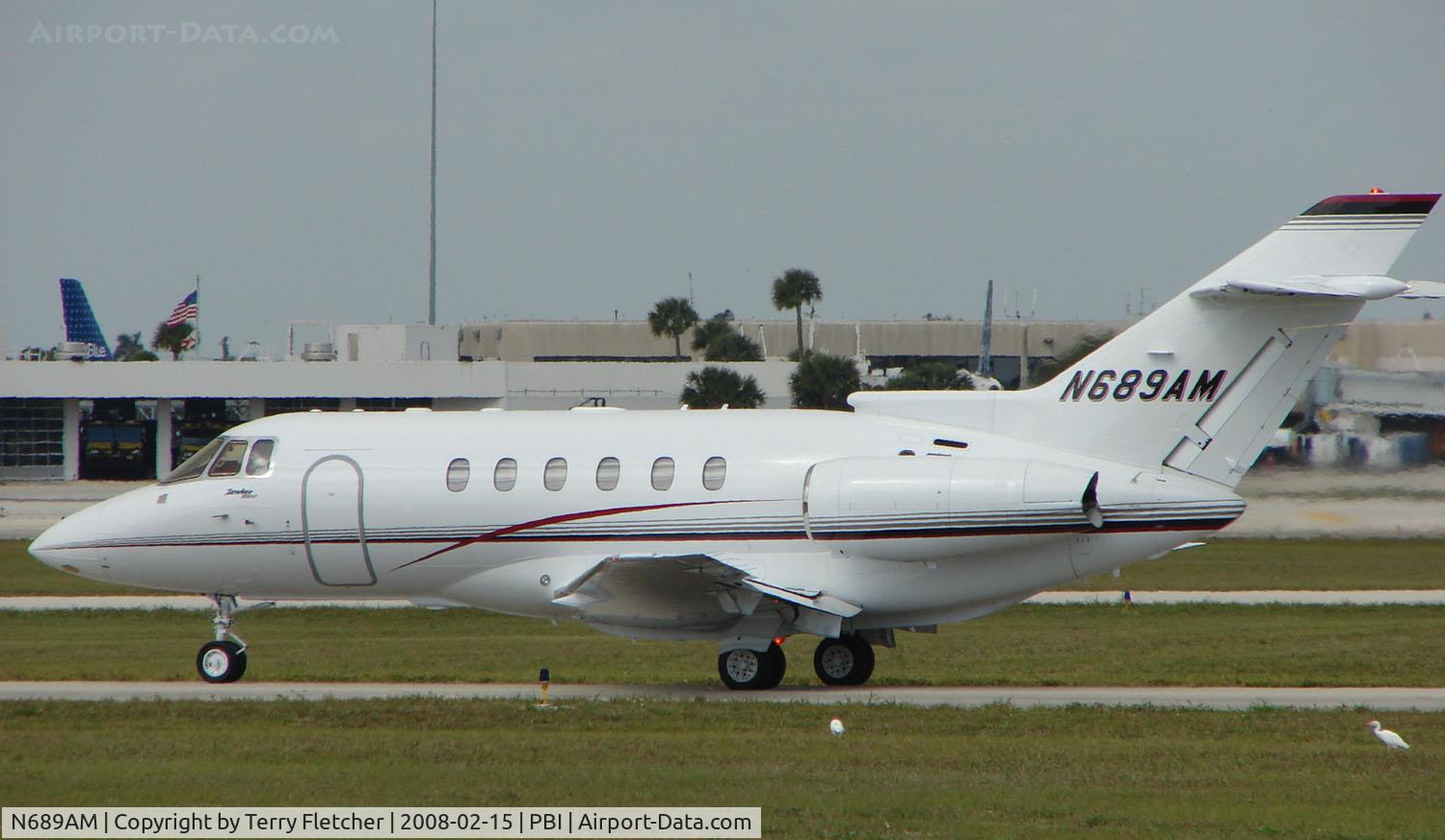 N689AM, 2004 Raytheon HAWKER 800XP C/N 258665, The business aircraft traffic at West Palm Beach on the Friday before President's Day always provides the aviation enthusiast / photographer with a treat