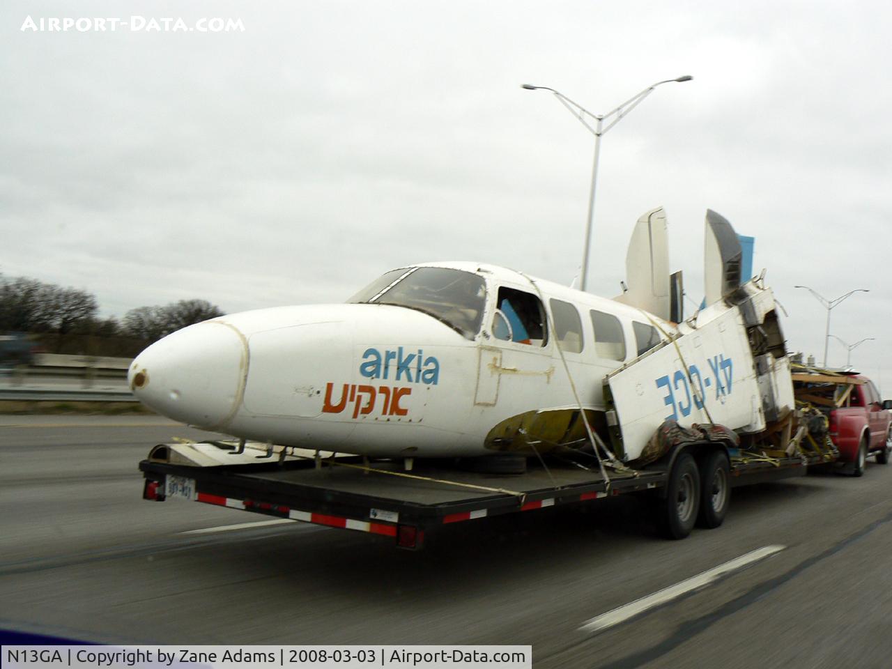 N13GA, 1976 Piper PA-31-350 Chieftain C/N 317652170, Registered as 4X-CCE see on flatbed truck eastbound IH-20 Ft. Worth, TX