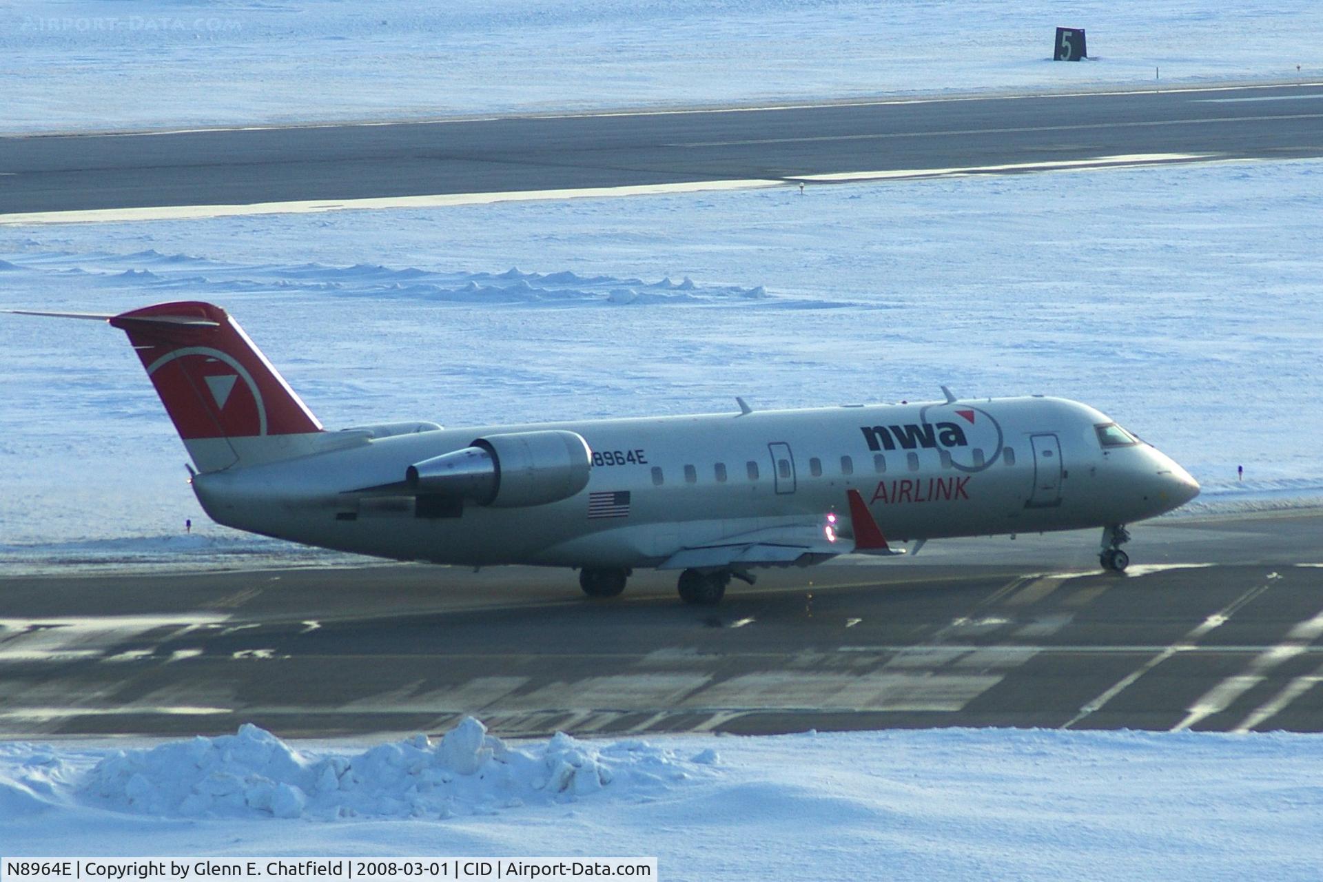 N8964E, 2004 Bombardier CRJ-200 (CL-600-2B19) C/N 7964, Taxiing to Runway 9 for departure