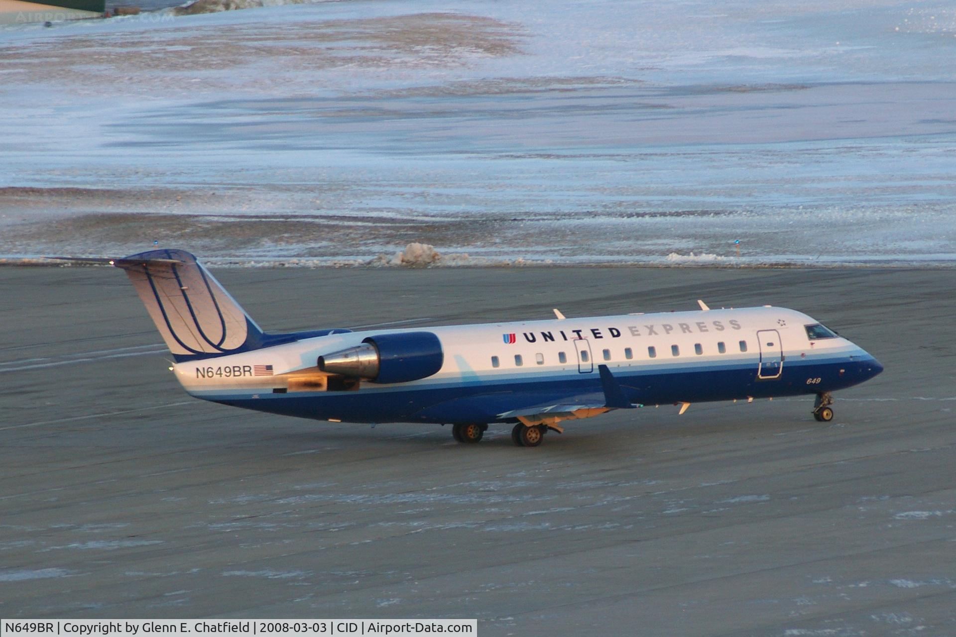 N649BR, 2000 Bombardier CRJ-200ER (CL-600-2B19) C/N 7414, Taxiing to Runway 9 for departure at sunset.
