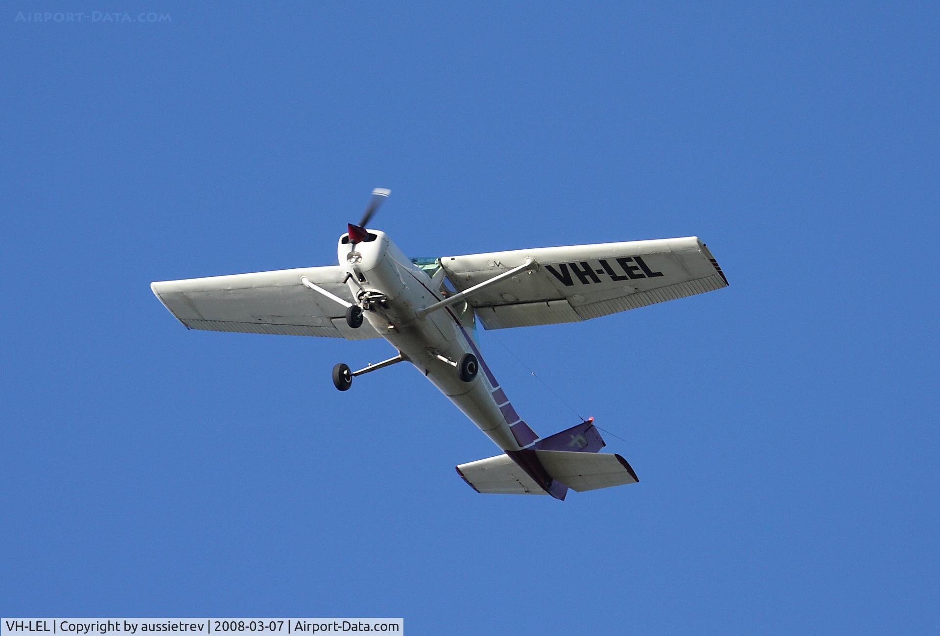 VH-LEL, 1979 Cessna 152 C/N 15283715, Damn low, tree top height over the Logan River almost head on with some Spoonbills heading the other way.