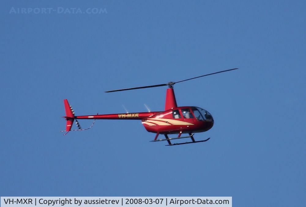 VH-MXR, 2006 Robinson R44 C/N 1663, Nice looking Robinson heading South over the Gold Coast