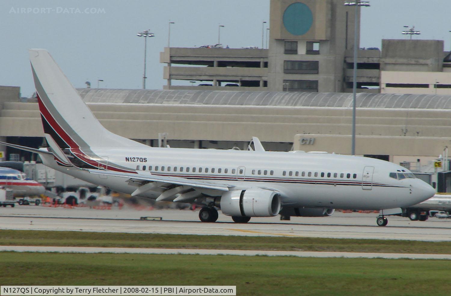 N127QS, 1999 Boeing 737-7BC C/N 30327, The business aircraft traffic at West Palm Beach on the Friday before President's Day always provides the aviation enthusiast / photographer with a treat