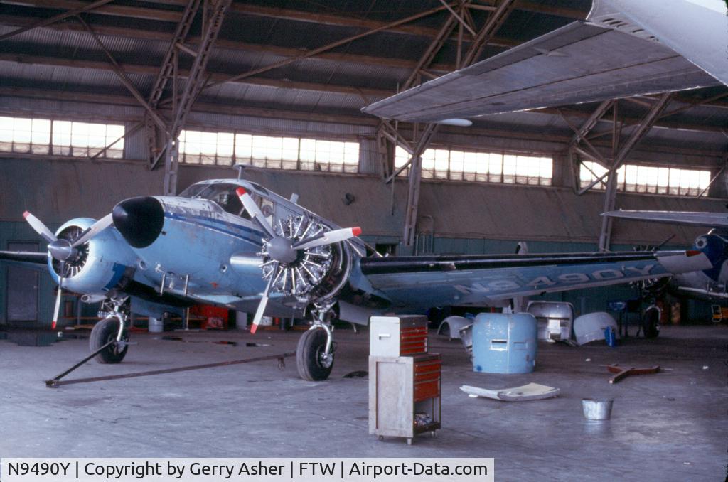 N9490Y, 1961 Beech G18S C/N BA-577, Taken inside SMB's maintenance hangar on the south end of Meacham Field - now occupied by the Vintage Flight Museum and the B-17G 