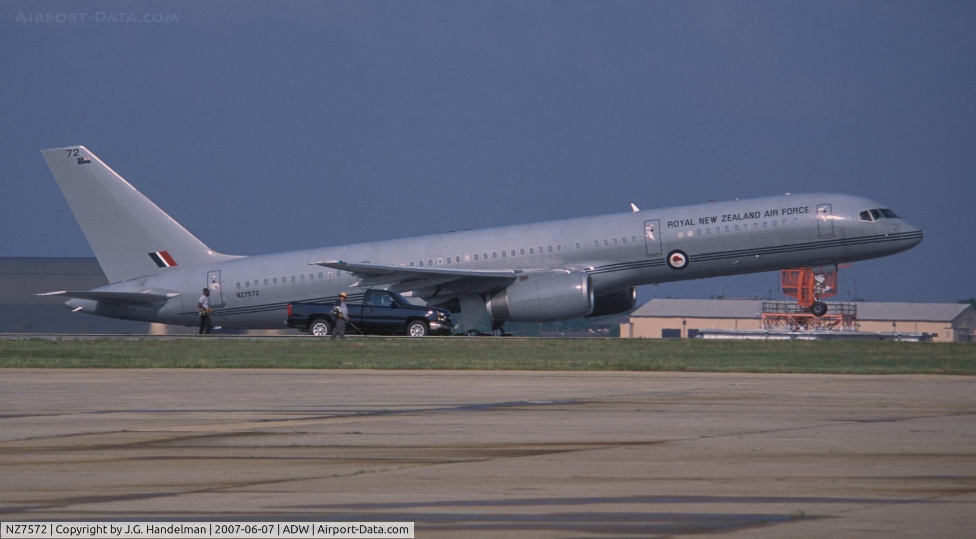 NZ7572, 1993 Boeing 757-2K2 C/N 26634, Take off next  to grass cutters  at ADW