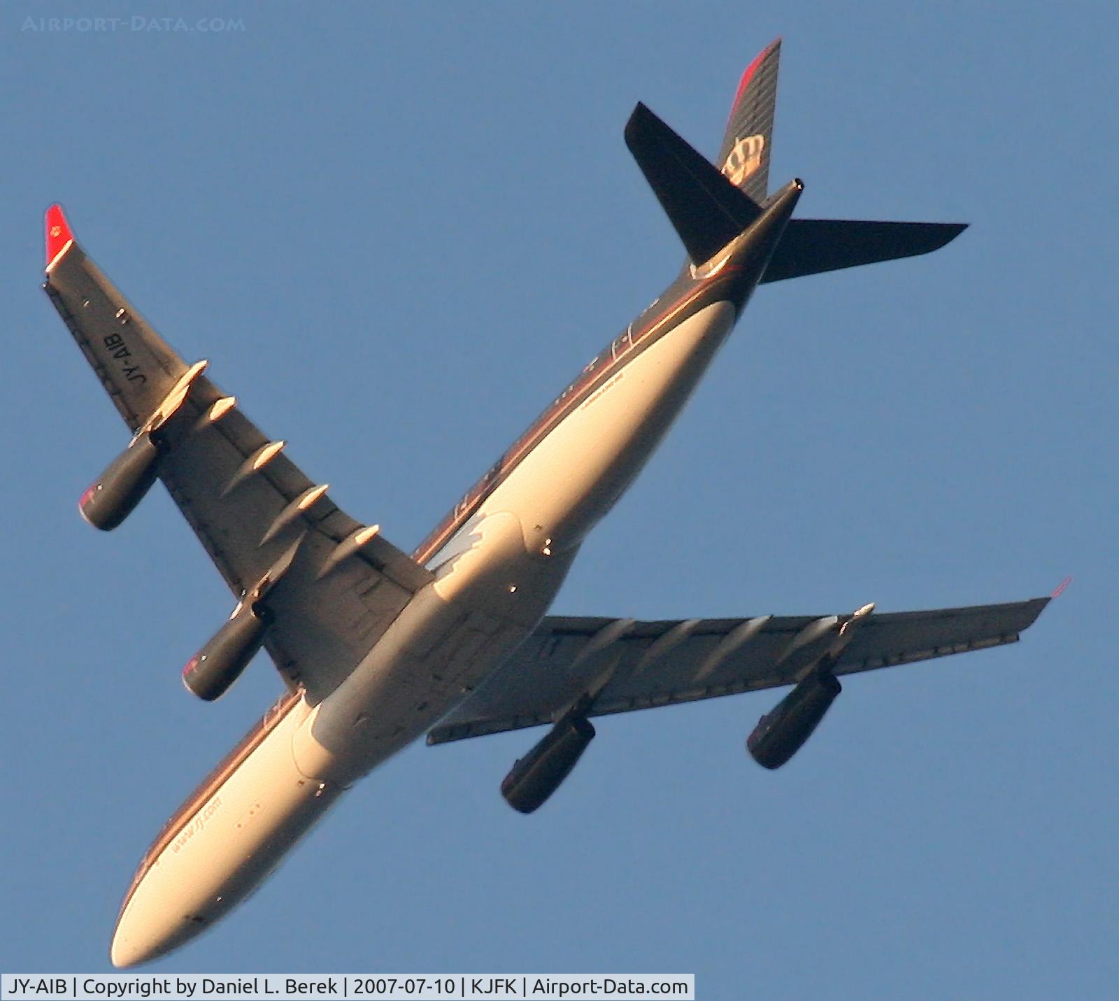 JY-AIB, 1994 Airbus A340-211 C/N 043, An older 343, resplendent in JY's elegant scheme, coasts over Sandy Hook, NJ, into JFK.