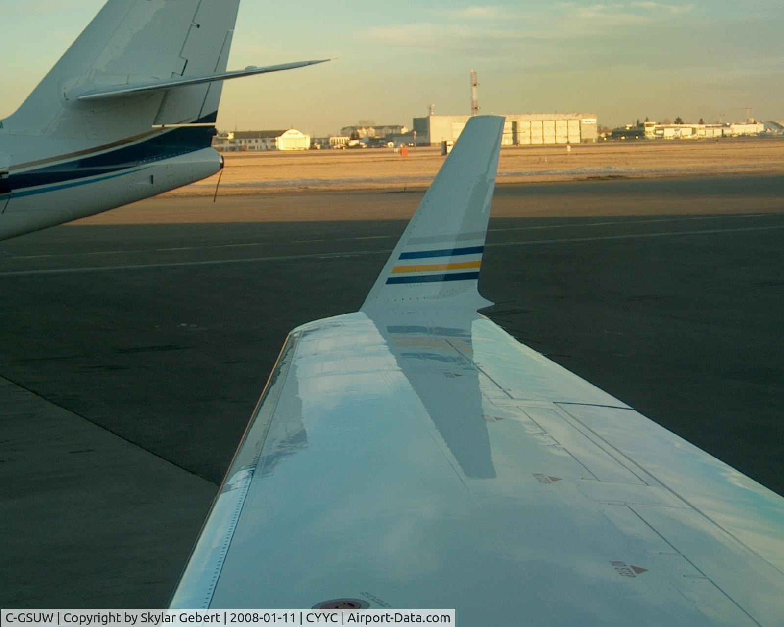 C-GSUW, 2005 Canadair CRJ-200LR (CL-600-2B19) C/N 8047, looking out at the rightside wing
