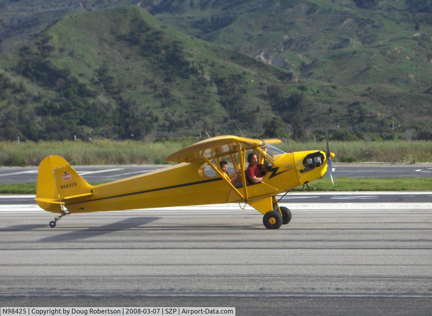 N98425, 1946 Piper J3C-65 Cub Cub C/N 18612, 1946 Piper J3C-65 CUB, Continental C90 upgrade, taxi off Rwy 22 after landing