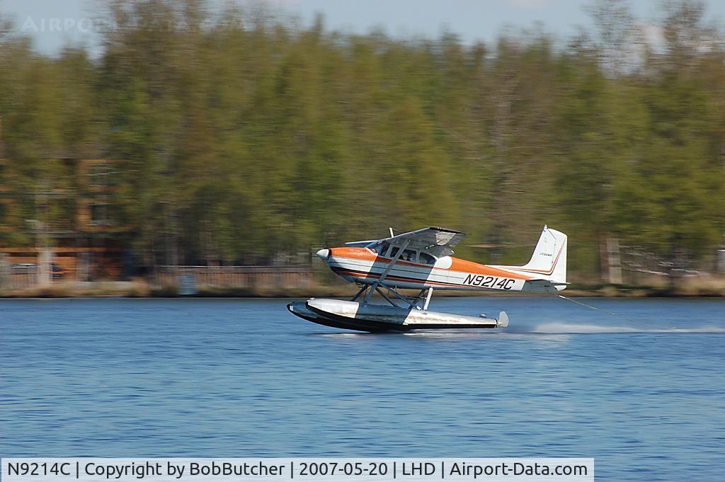 N9214C, 1954 Cessna 180 C/N 31313, Departing Anchorage's Lake Hood.