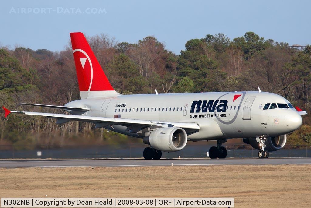 N302NB, 1999 Airbus A319-114 C/N 1062, Northwest Airlines N302NB (FLT NWA508) starting takeoff roll on RWY 23 enroute to New York La Guardia (KLGA). This flight originated in Minneapolis bound for La Guardia but was diverted to Norfolk.
