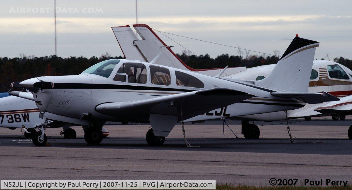 N52JL, 1969 Beech E33 Bonanza C/N CD-1180, Closer to her, on the nearly-crowded ramp