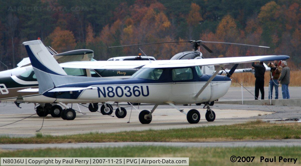 N8036U, 1976 Cessna 150M C/N 15077879, Looks like she is overseeing the helo ops