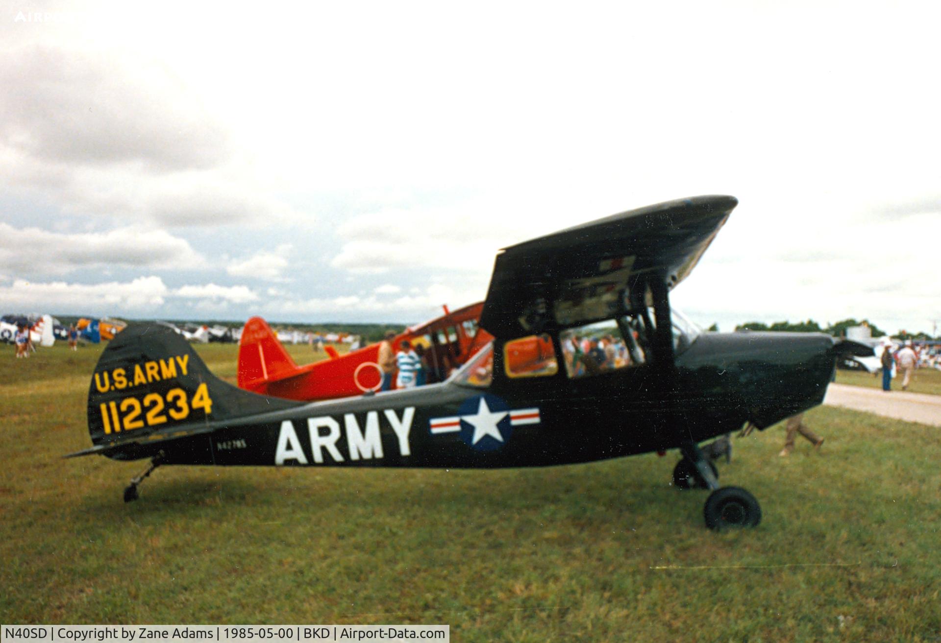 N40SD, Cessna 305A C/N 22548, Marked as N427BS currently flying in USAF gray paint.