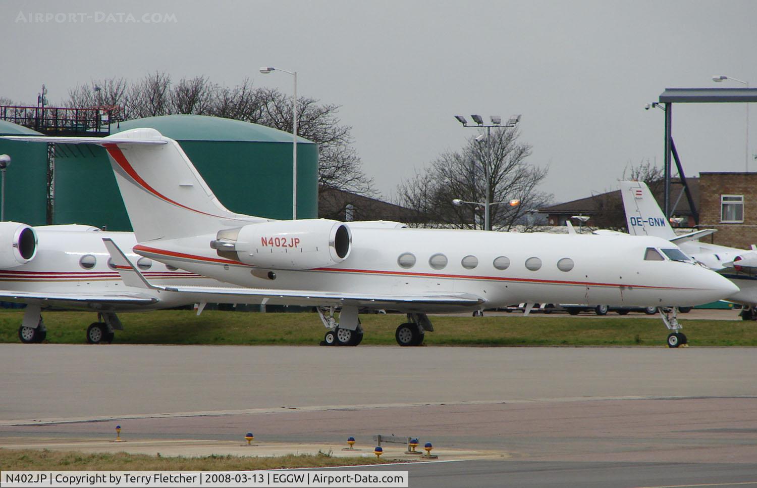 N402JP, 1996 Gulfstream Aerospace G-IV C/N 1283, Gulf 1159C on stand at Luton