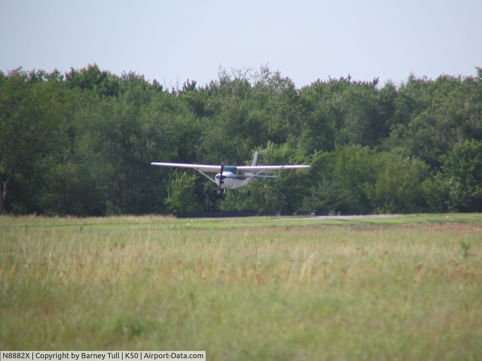 N8882X, 1961 Cessna 182D Skylane C/N 18253282, Landing at Cook Field