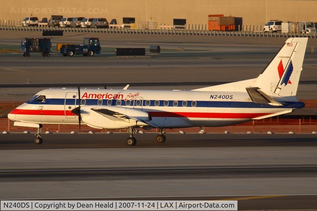 N240DS, 1991 Saab 340B C/N 340B-240, American Eagle N240DS (FLT EGF3068) from San Diego Int'l (KSAN) exitting RWY 25L after landing.