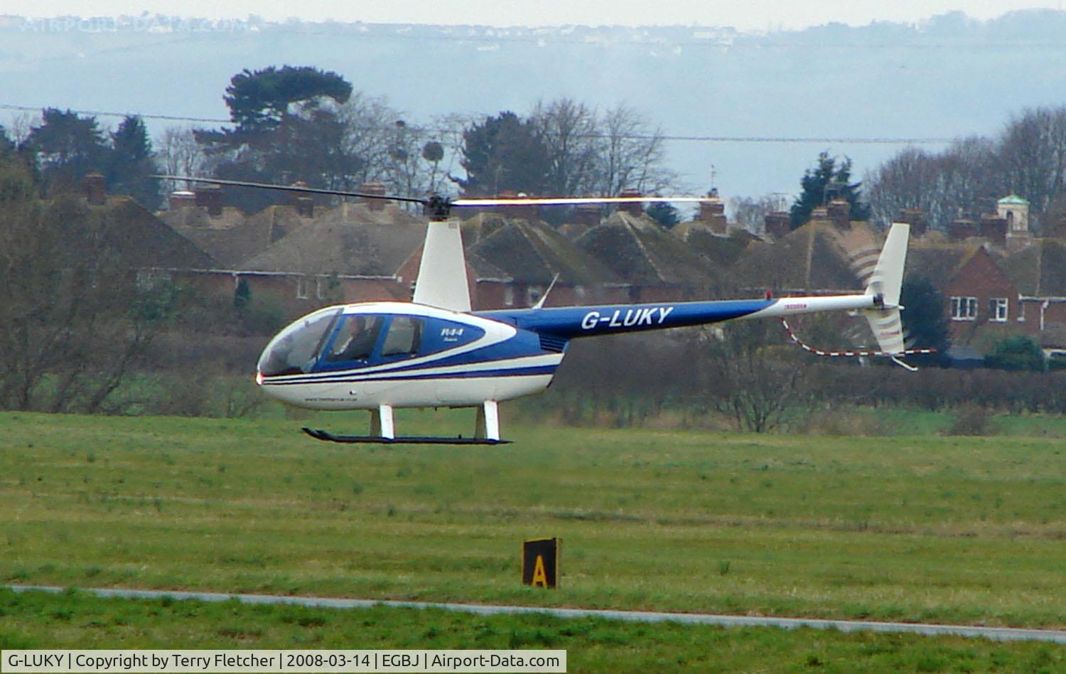 G-LUKY, 1997 Robinson R44 Astro C/N 0357, A visitor to Gloucestershire Airport on the day of the horse racing Gold Cup  at the nearby Cheltenham Racecourse
