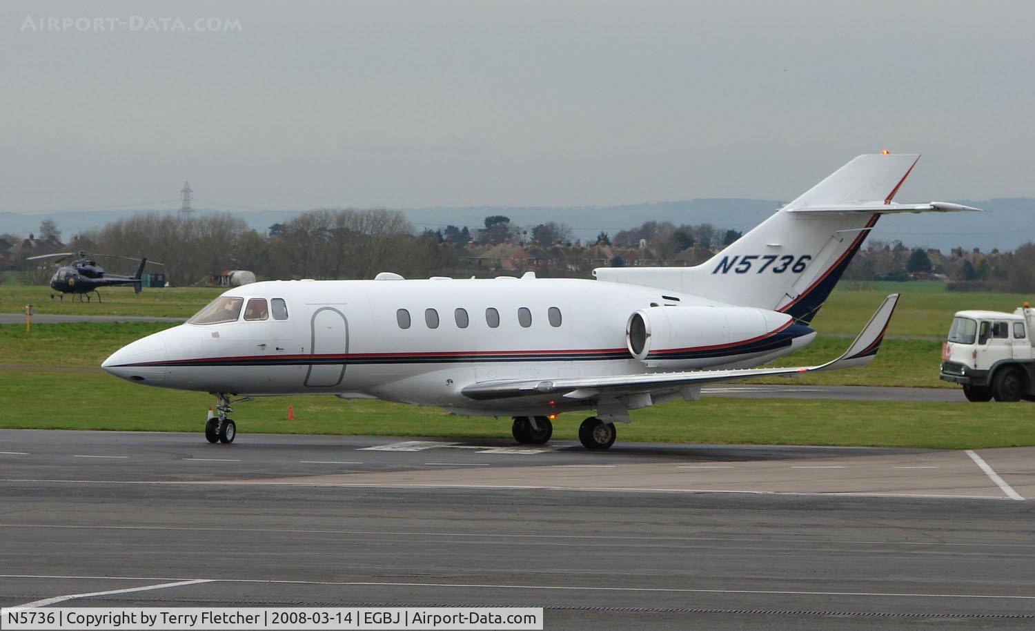 N5736, 2000 Raytheon Hawker 800XP C/N 258471, A visitor to Gloucestershire Airport on the day of the horse racing Gold Cup  at the nearby Cheltenham Racecourse