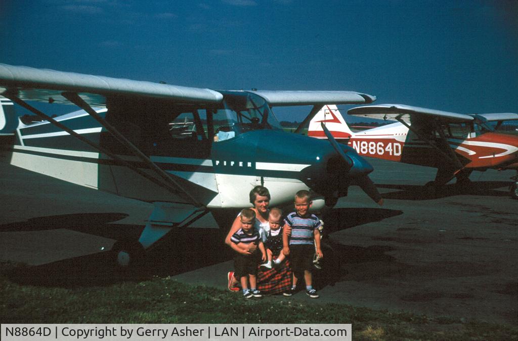 N8864D, 1958 Piper PA-22-160 Tri Pacer C/N 22-6038, Me on the left, taken late summer or early fall - Dad was working on his commercial rating - don't know the N number of the bird in the foreground.
