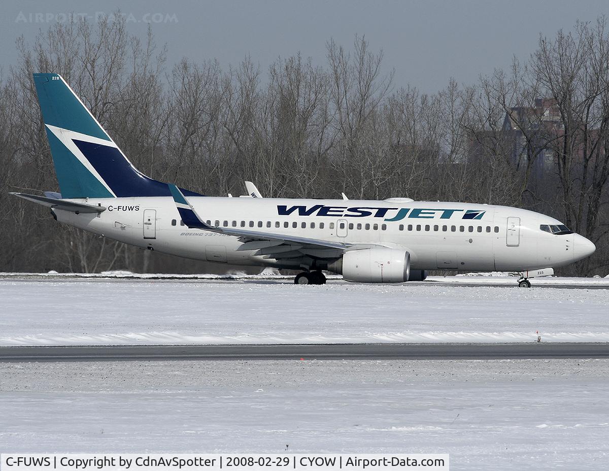 C-FUWS, 2004 Boeing 737-7CT C/N 32765, Westjet B737 taxiing for takeoff on Rwy 25