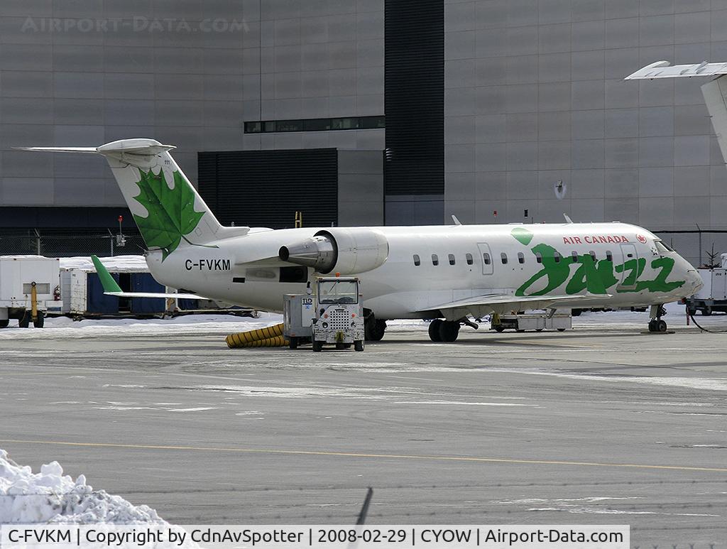 C-FVKM, 1995 Canadair CRJ-100ER (CL-600-2B19) C/N 7074, Jazz CRJ-100 parked in the US Departures/Arrivals terminal