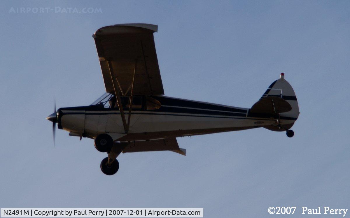 N2491M, 1947 Piper PA-12 Super Cruiser C/N 12-1698, Peeling on by...you can usually catch her ar Rat Landing