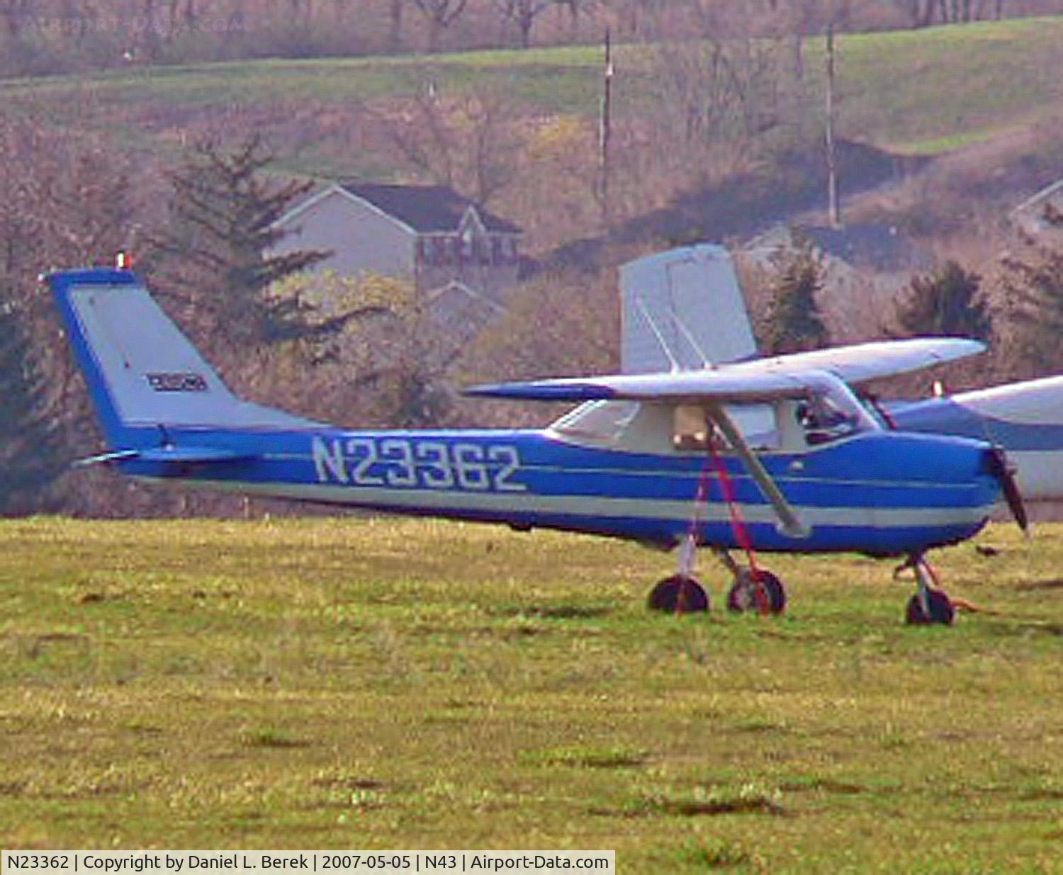 N23362, 1968 Cessna 150H C/N 15068903, Bright blue Cessna shimmers in the evening summer haze.
