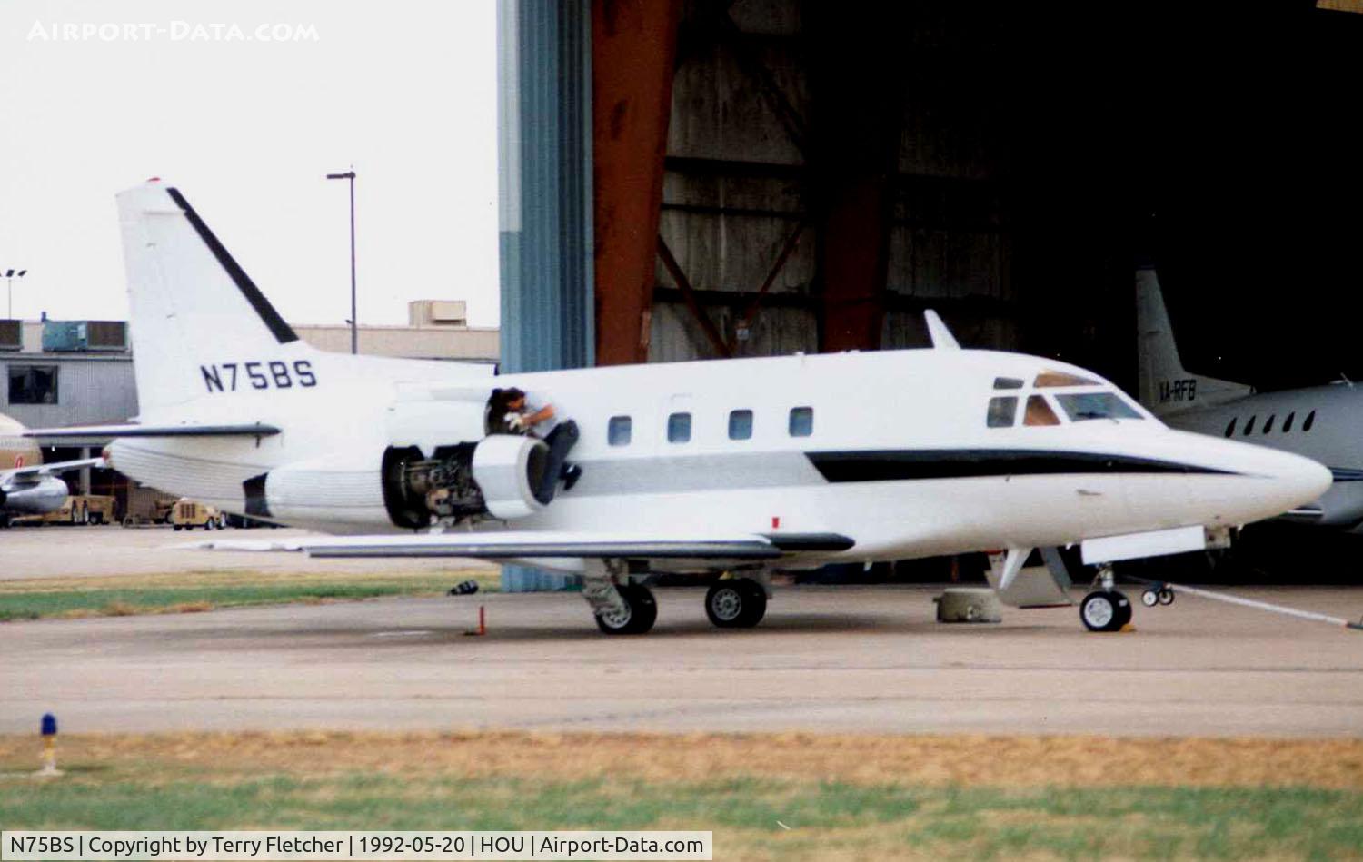 N75BS, 1974 North American Sabre 75A C/N 380-12, Sabre 75a receiving attention at Houston Hobby in 1992