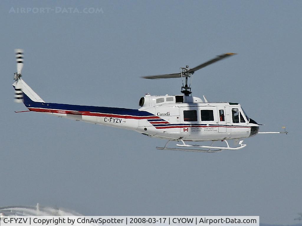 C-FYZV, 1969 Bell 205A-1 C/N 30055, National Research Council (NRC) Bell 205 Helicopter doing hovering exercises