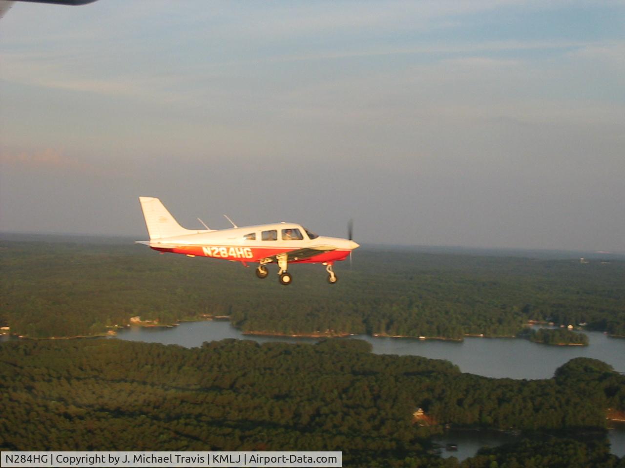 N284HG, 1995 Piper PA-28-161 C/N 2842009, N284HG in formation over KMLJ  (photo taken from N721HG)