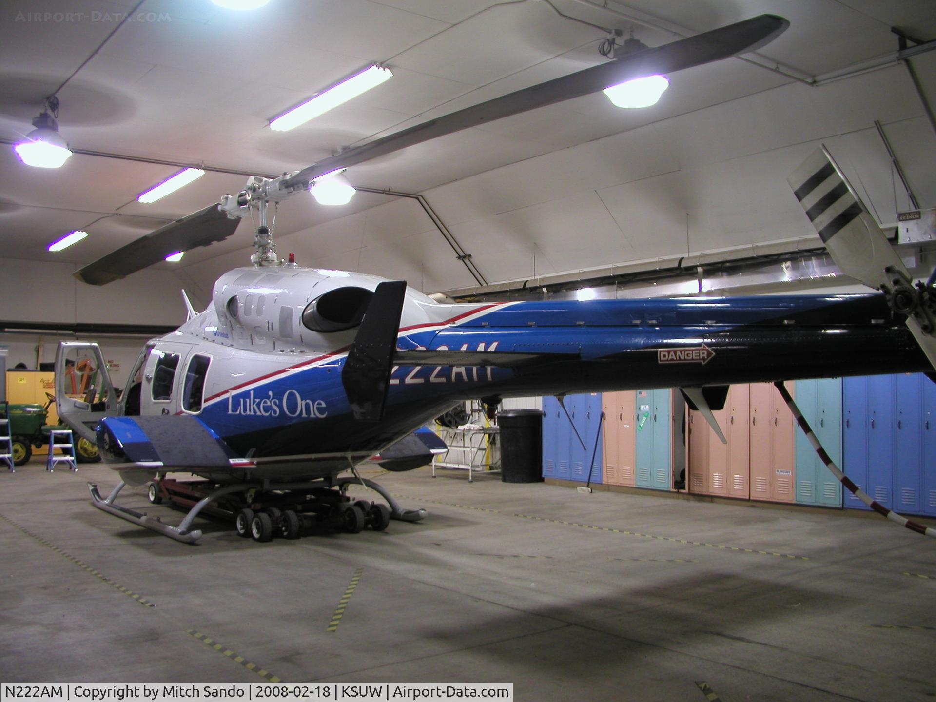 N222AM, 1986 Bell 222U C/N 47547, Luke's One in the hangar at Superior.