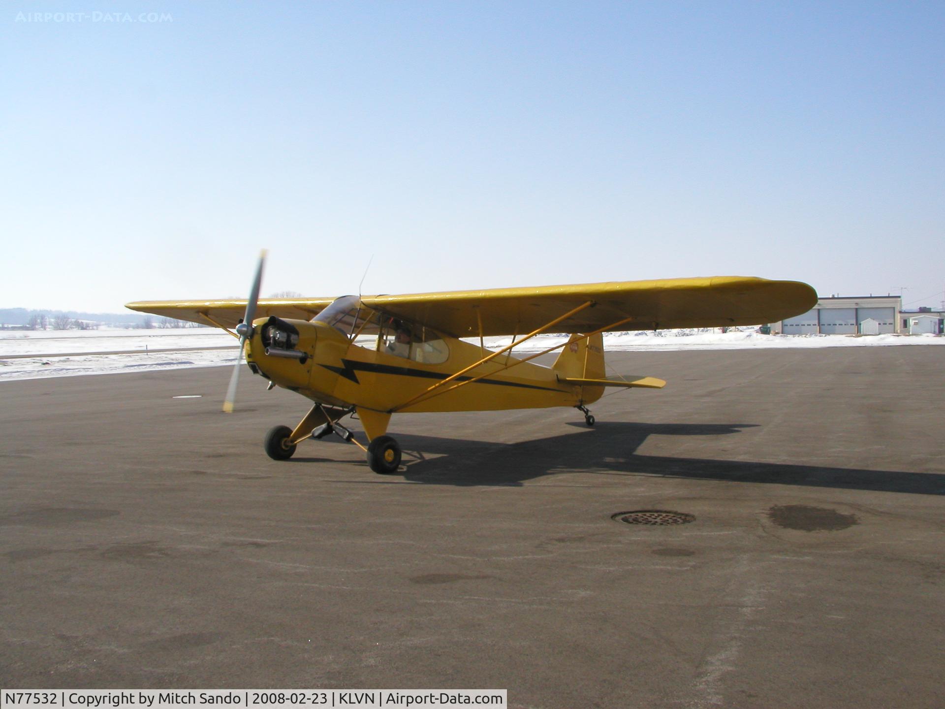 N77532, 1947 Piper J-3C Cub C/N 22037, Starting up at the fuel pumps.