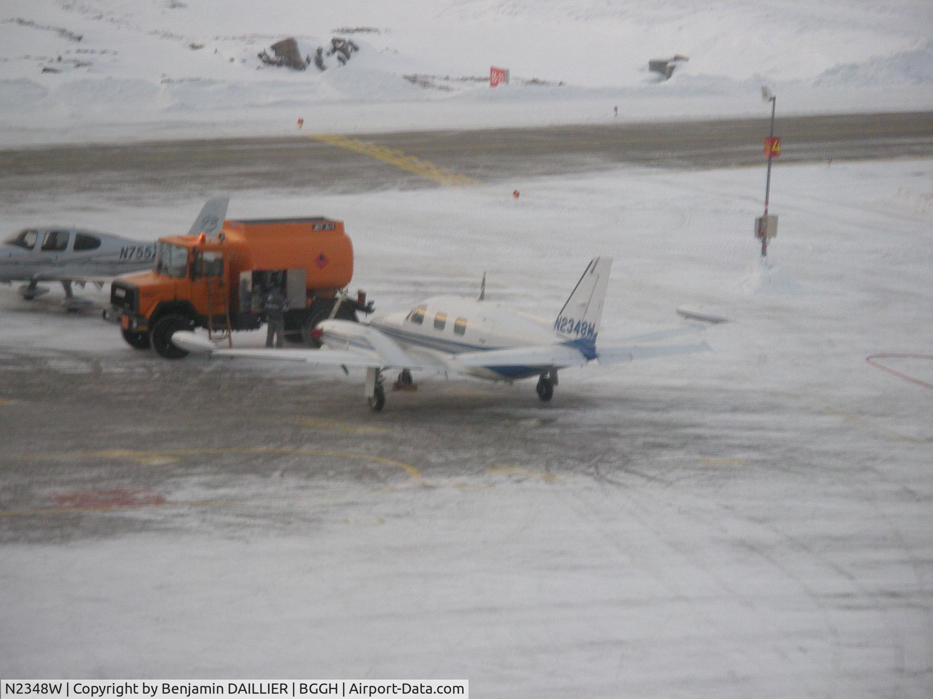 N2348W, 1979 Piper PA-31T1 C/N 31T-7904057, refuelling the plane in Nuuk Greenland