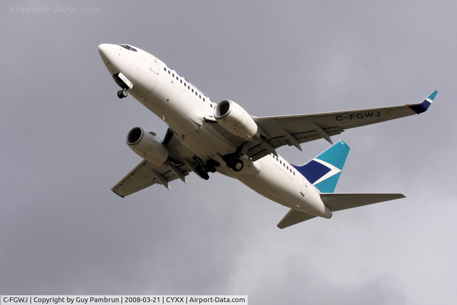 C-FGWJ, 2004 Boeing 737-7CT C/N 32764, Wheels Going Into The Well