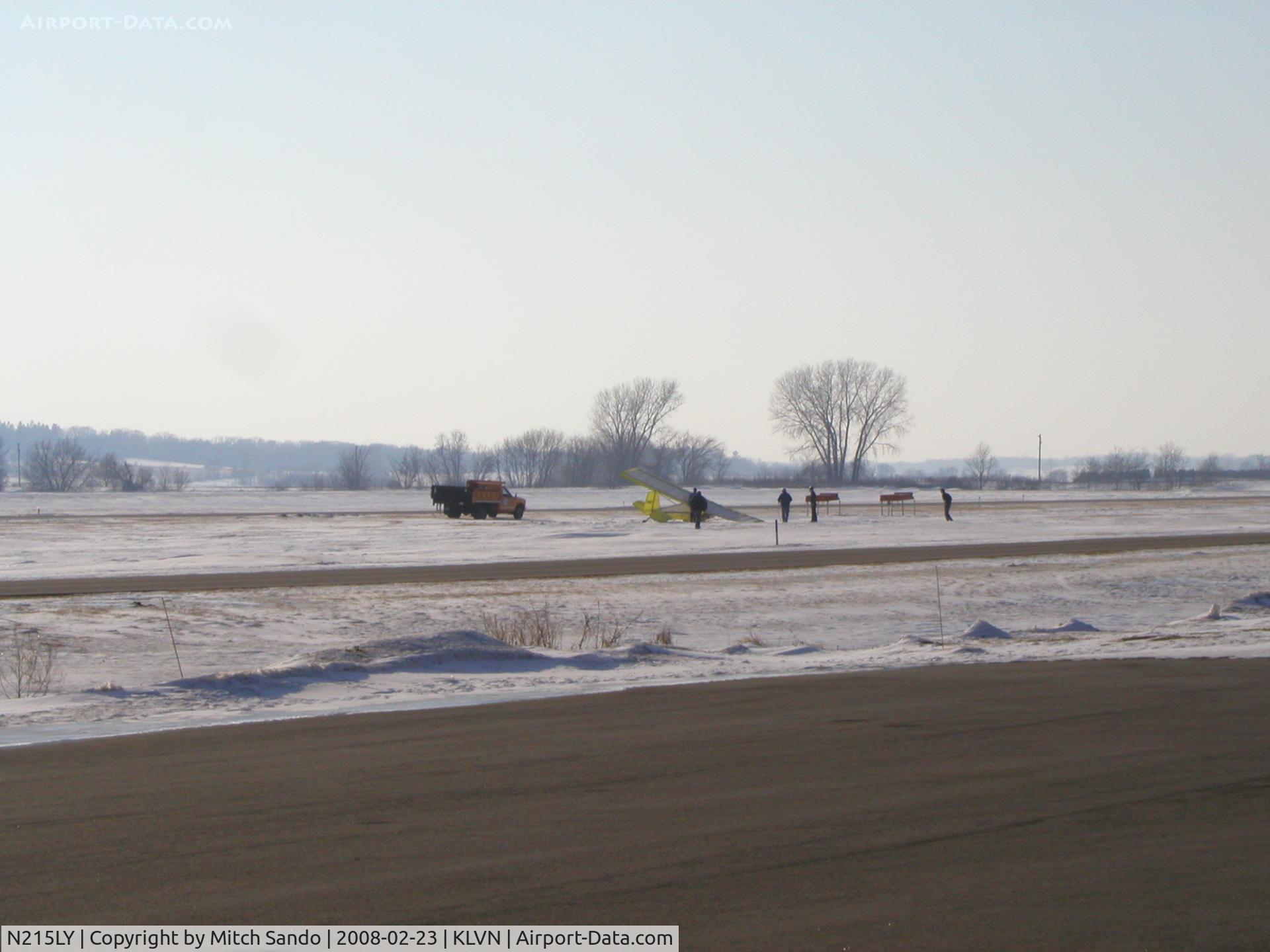N215LY, 2007 Rans S-4 Coyote I C/N 00299, Just after takeoff a gust of wind blew across the runway causing the left wing to hit the ground and the plane spun off of the runway.