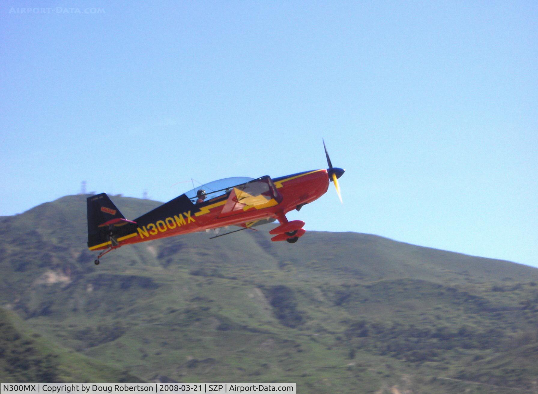 N300MX, 1998 Extra EA-300/L C/N 060, 1998 Extra Fleugzeugbau Gmbh 300/L AKROBAT, Lycoming AEIO-540-L1B5 300 Hp, takeoff climb Rwy 22
