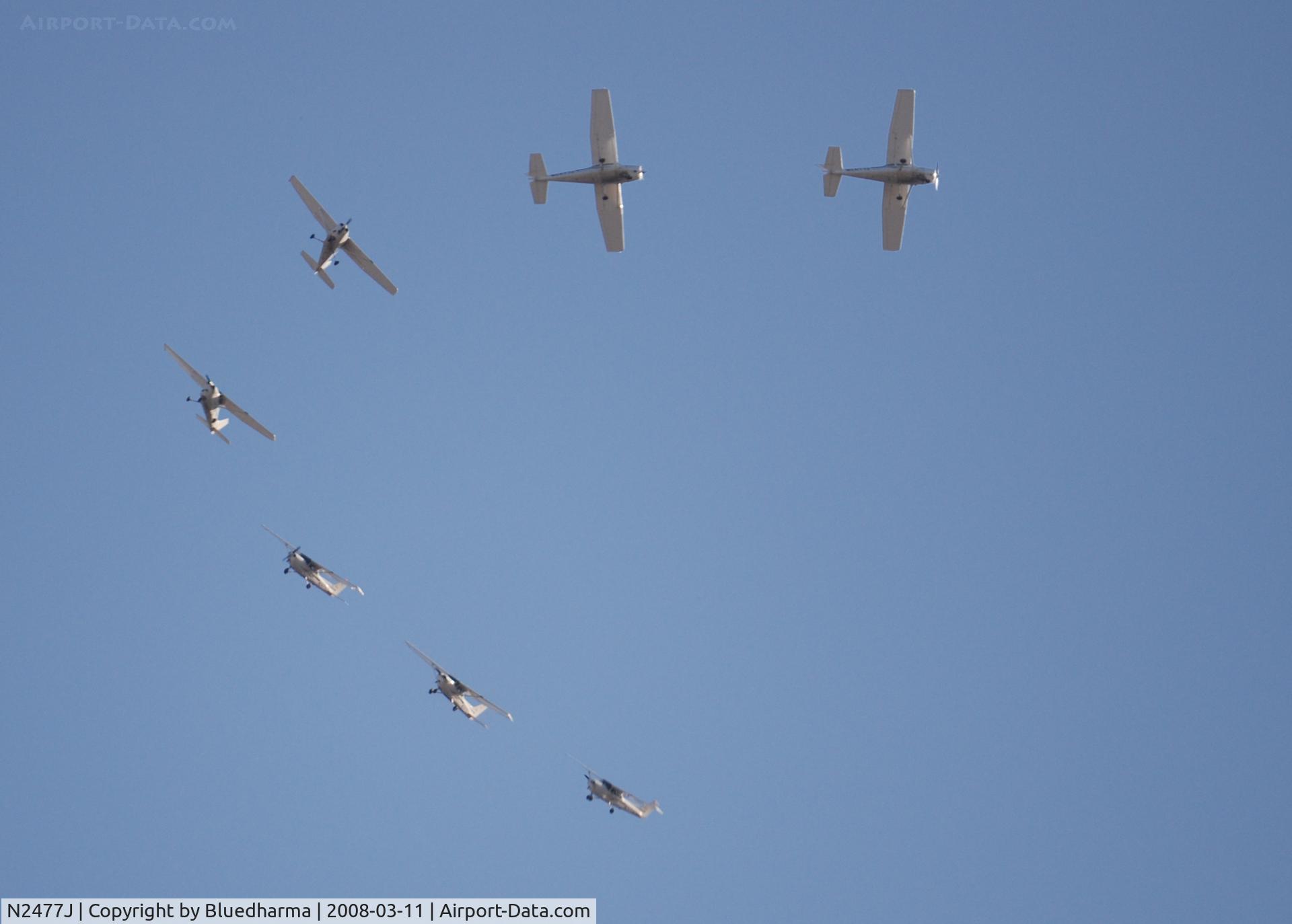 N2477J, 2001 Cessna 172S C/N 172S8802, Montage: Making a tight turn over Columbine High School Littleton Colorado