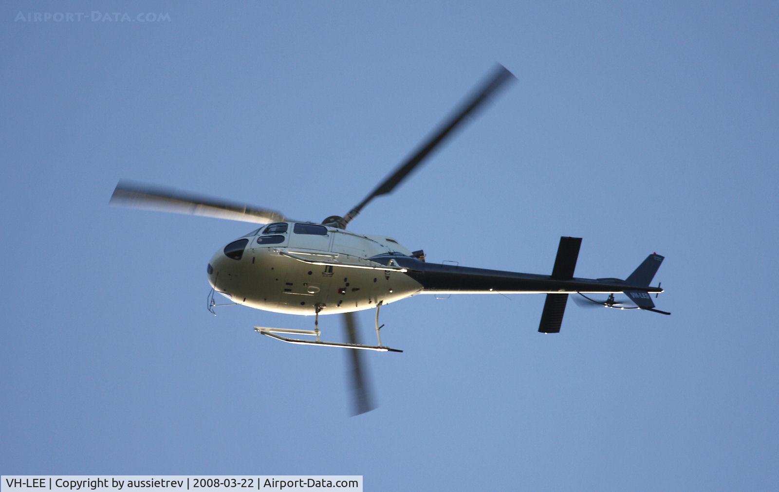 VH-LEE, 2000 Aerospatiale AS-350BA Ecureuil C/N 4529, Executive Helicopters southbound on the Gold Coast