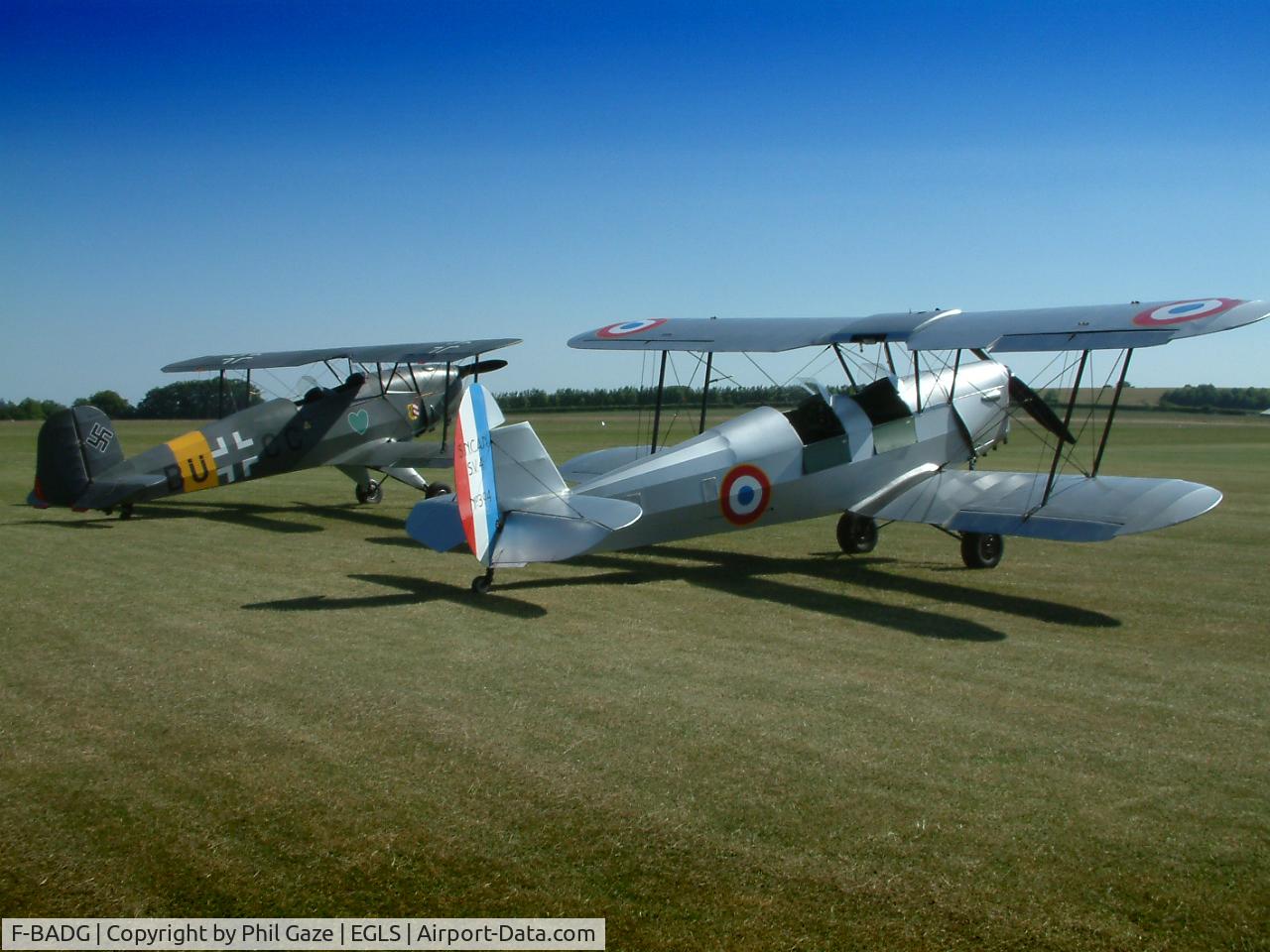 F-BADG, Nord Stampe SV-4C C/N 394, ex F-BADG, now G-BIMO with G-BUCC in the background