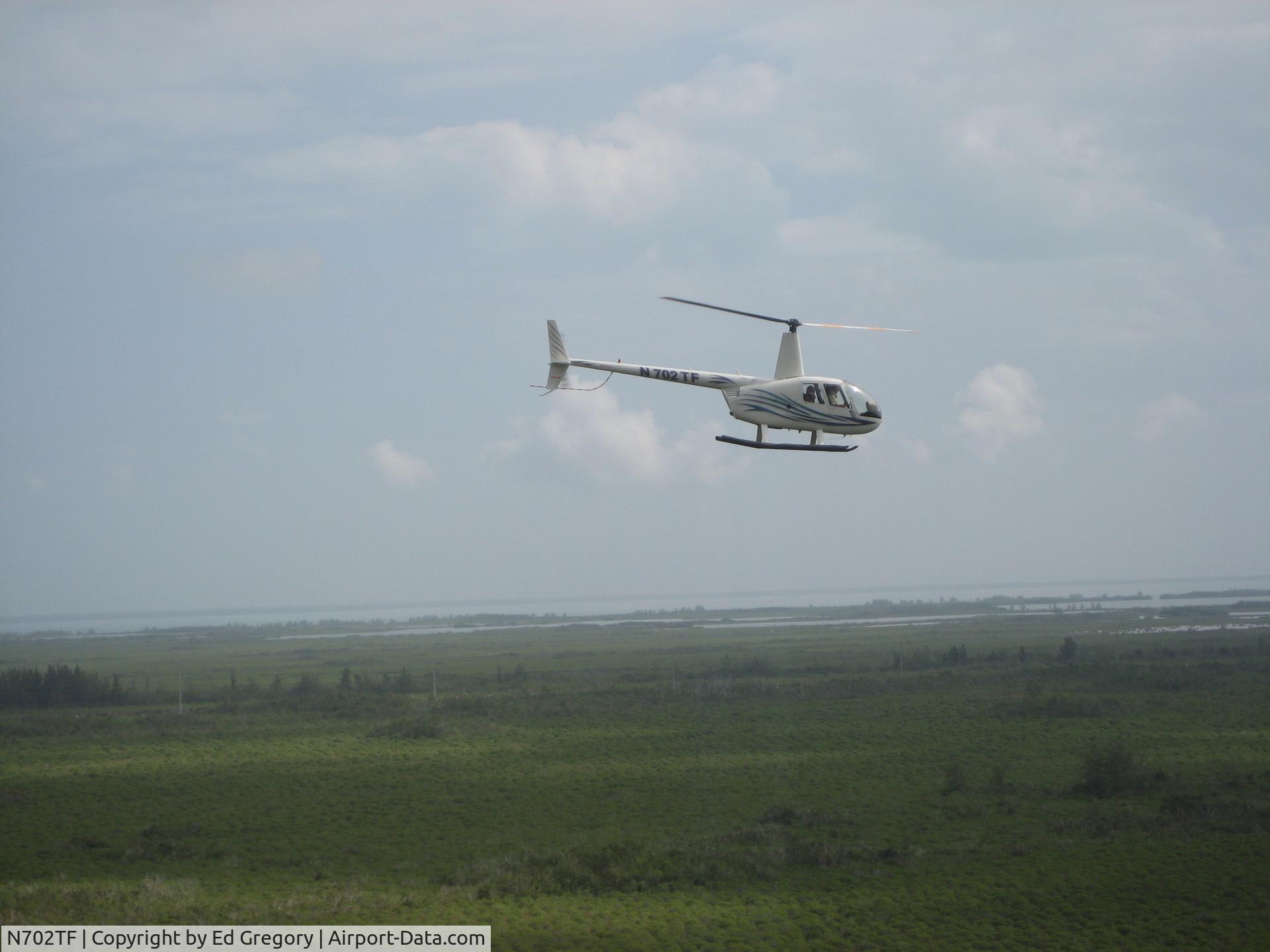 N702TF, 2001 Robinson R44 C/N 1029, TF over south FL
