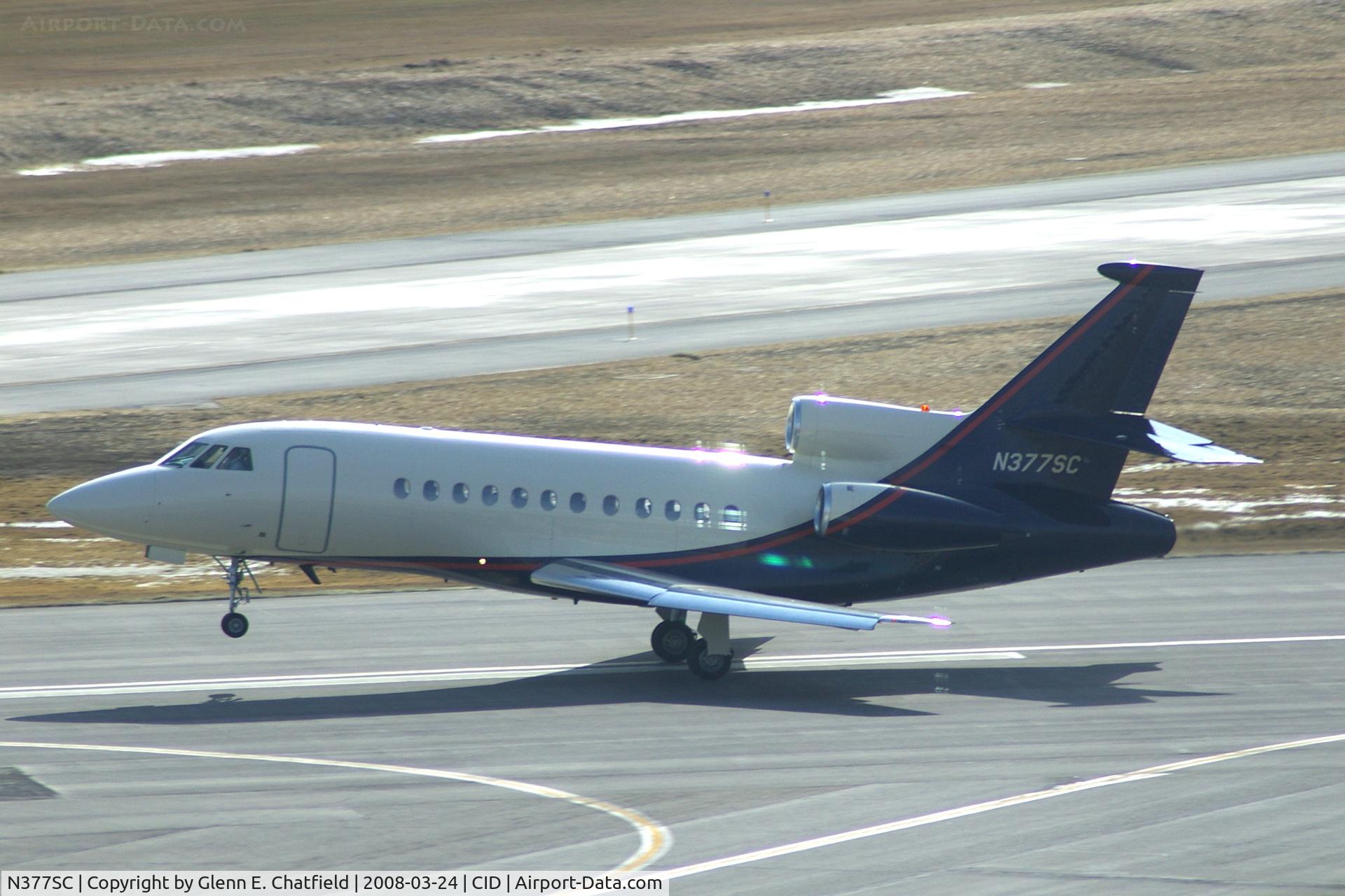 N377SC, 2000 Dassault Falcon 900EX C/N 66, Taking off on Runway 13, rotation.  Photo shooting into the sun