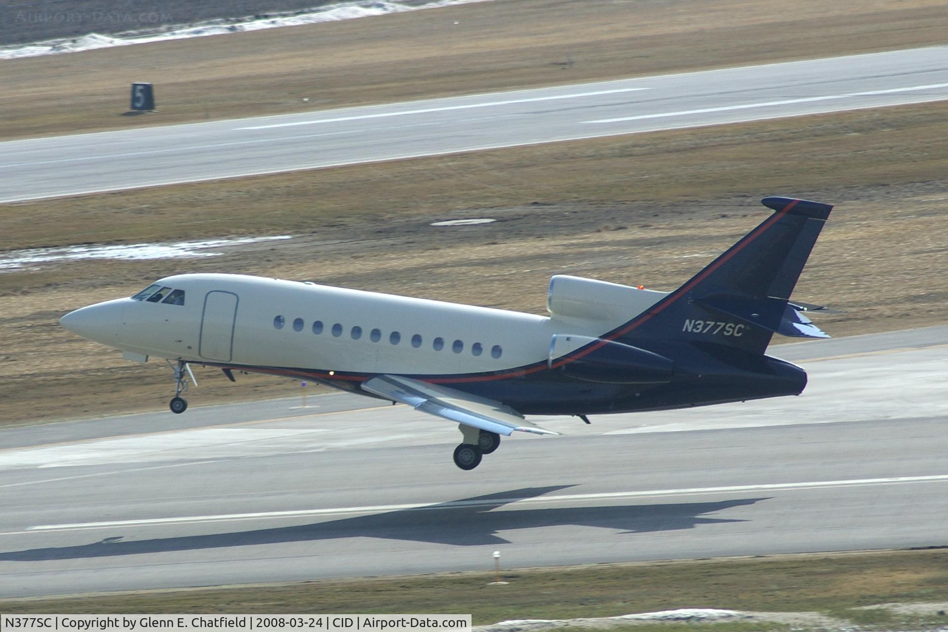 N377SC, 2000 Dassault Falcon 900EX C/N 66, Taking off on Runway 13.  Photo shooting into the sun