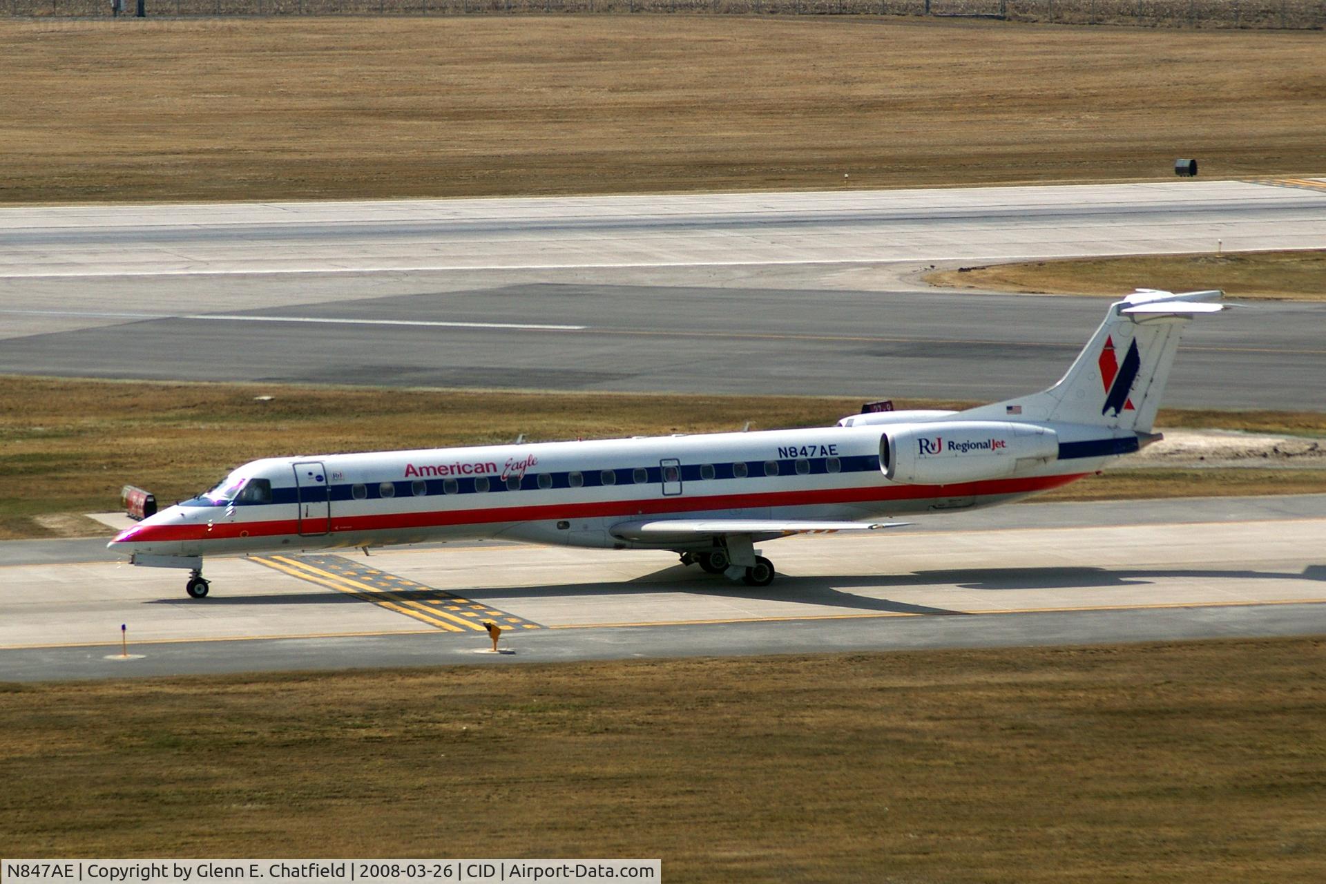 N847AE, 2003 Embraer ERJ-140LR (EMB-135KL) C/N 145707, Taxiing inbound on Alpha from Runway 27