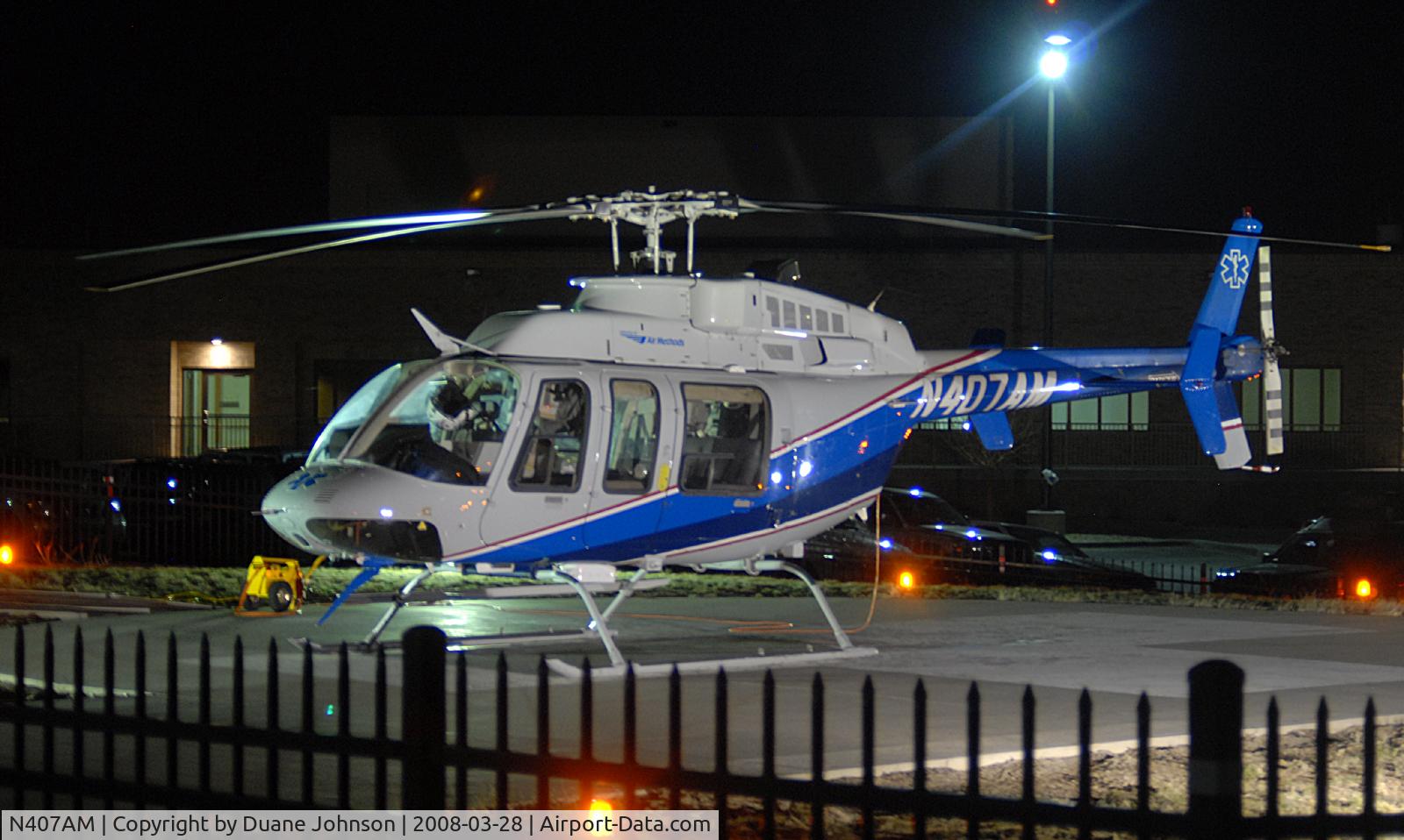 N407AM, 1998 Bell 407 C/N 53309, Sitting at Sky Ridge Medical Facility in Lone Tree, Co