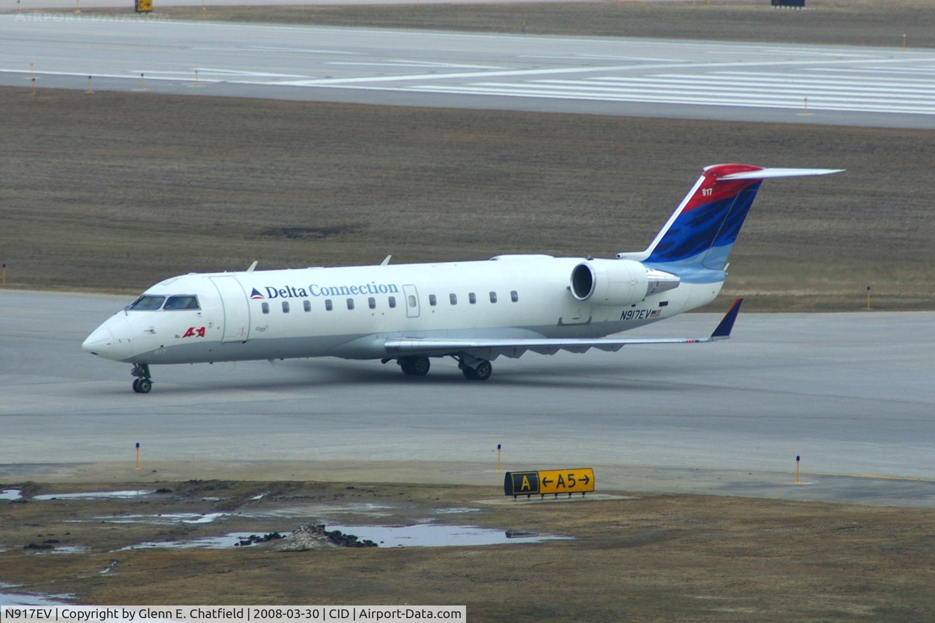 N917EV, 2003 Bombardier CRJ-200ER (CL-600-2B19) C/N 7769, Exiting at Alpha 5 for the gate