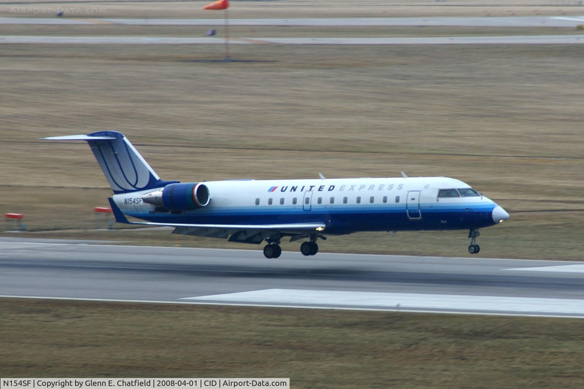 N154SF, 1996 Canadair CRJ-200LR (CL-600-2B19) C/N 7154, About to touch down on  Runway 27
