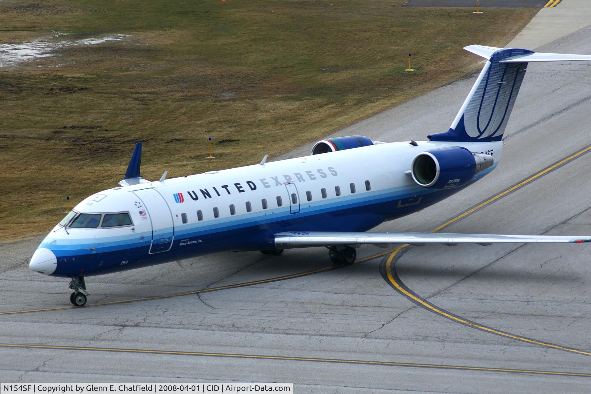 N154SF, 1996 Canadair CRJ-200LR (CL-600-2B19) C/N 7154, Taxiing in on Alpha 4 to the ramp