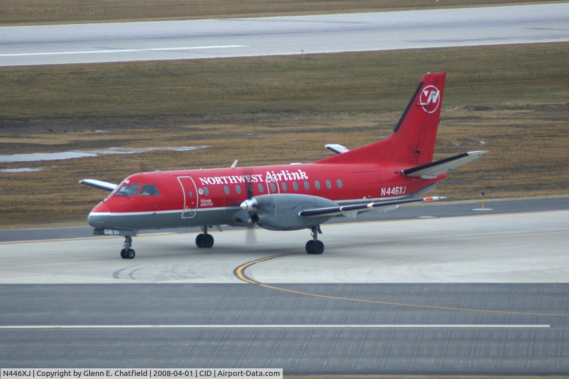 N446XJ, 1998 Saab 340B C/N 340B446, Taxiing on Alpha crossing Runway 13/31